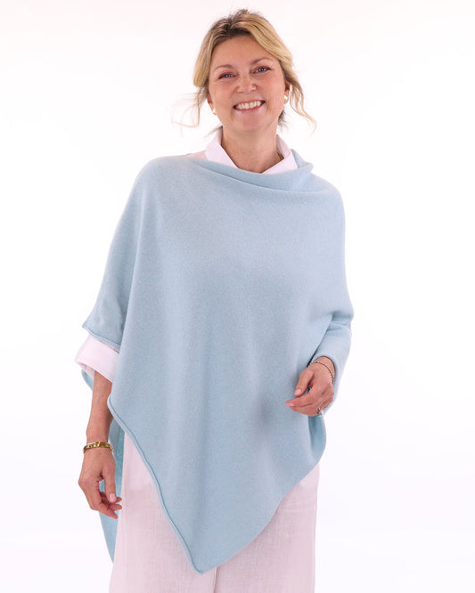 Women's cashmere blend poncho in sky blue, made in Italy