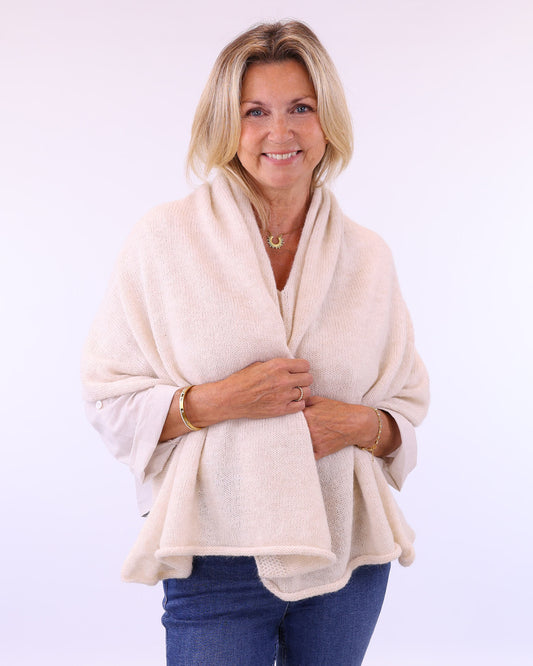 Women's Italian Alpaca Blend Poncho in cream, worn in the style of a scarf,made in Italy