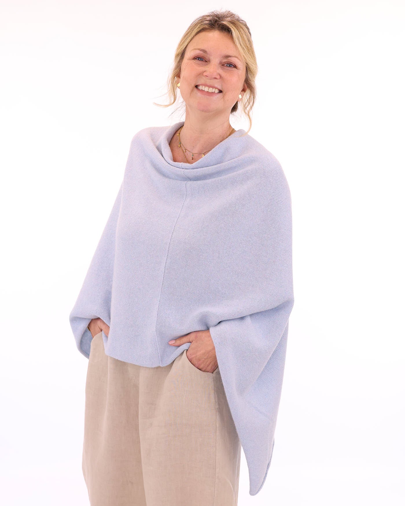 Women's cashmere blend poncho in duck egg blue, made in Italy