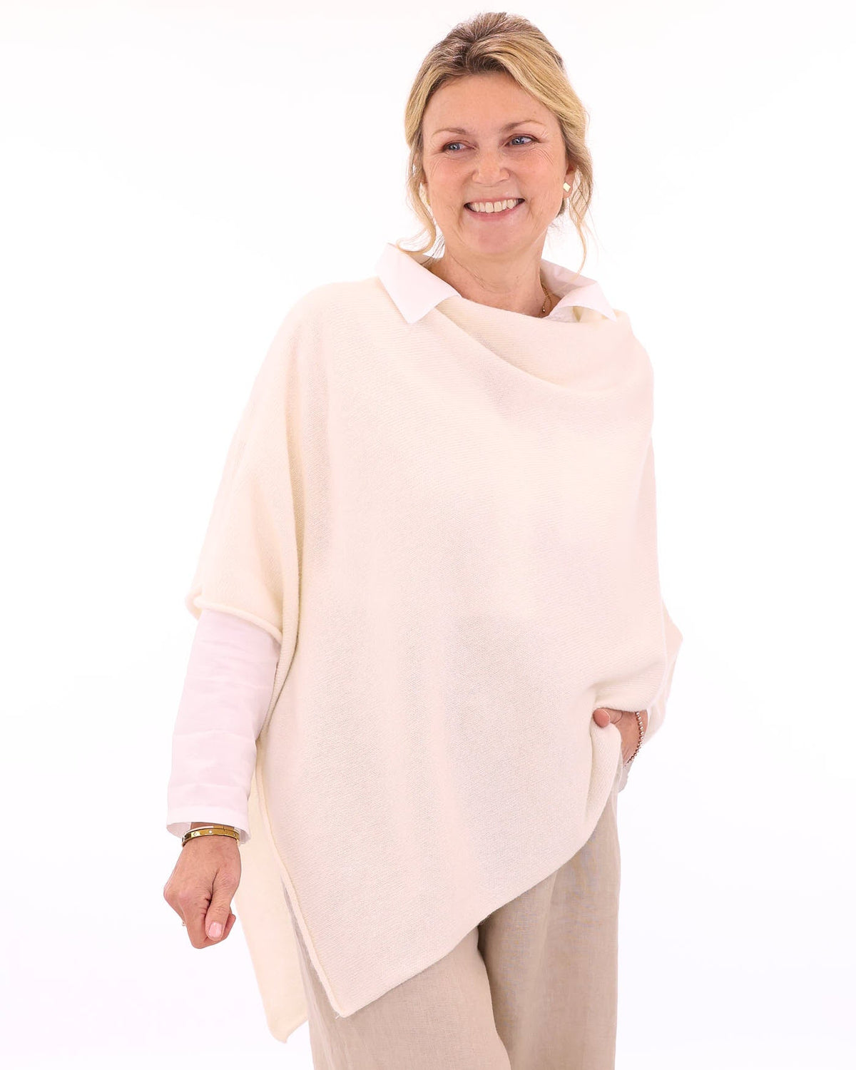 Women's cashmere blend poncho in ivory white, made in Italy