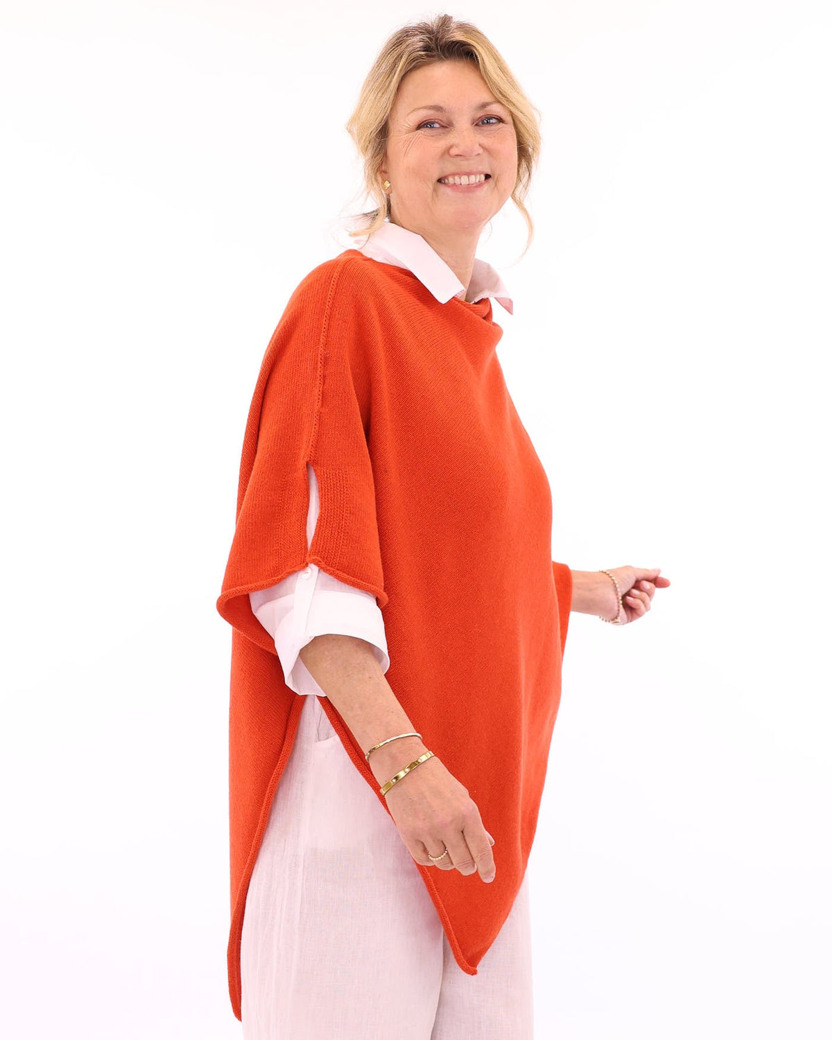 Women's cashmere blend poncho in sunset orange, made in Italy