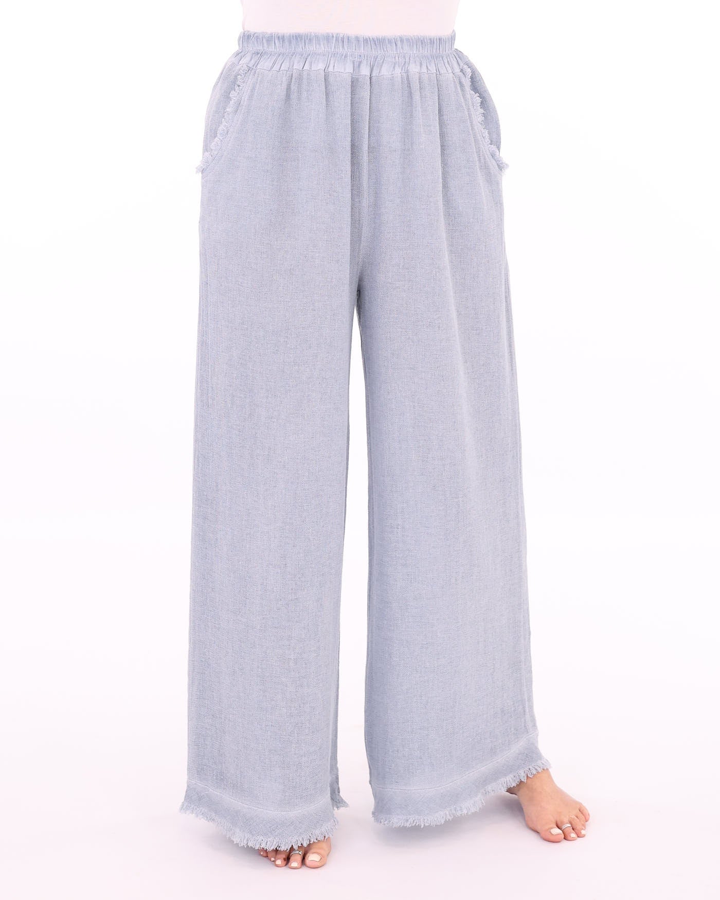 Women's Italian Linen Full Length Trousers with pockets and a frayed hem in blue, made in italy