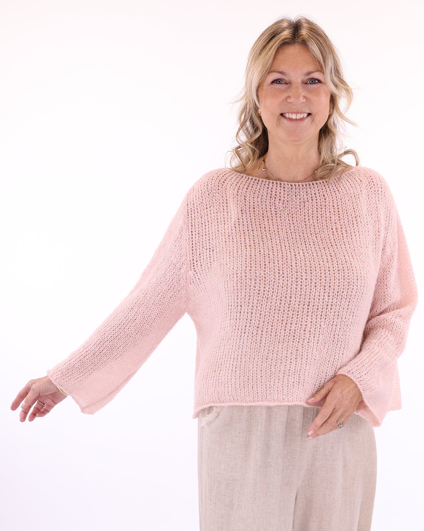 Women's long sleeve cobweb alpaca blend knitted sweater in pale pink, made in Italy