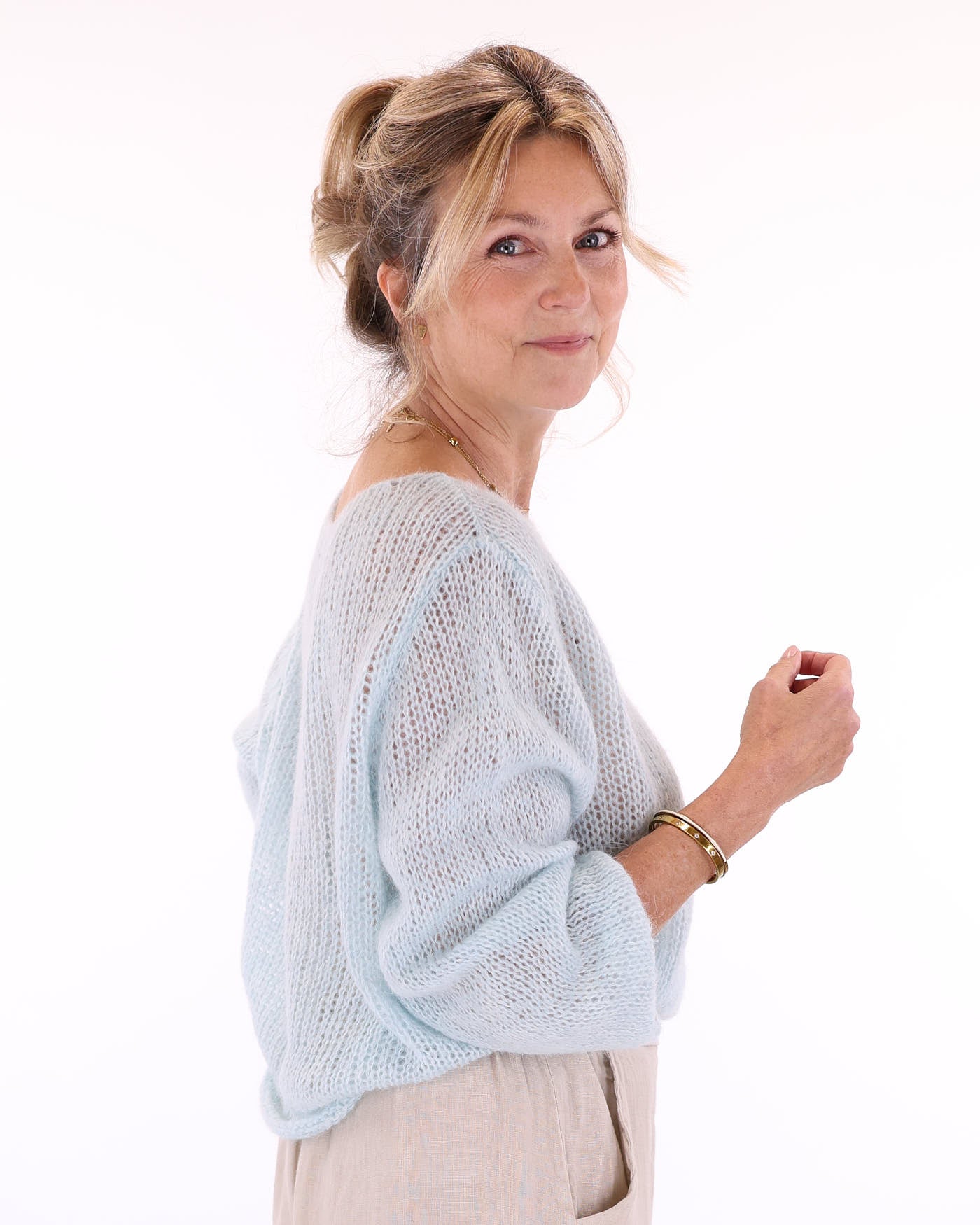 Women's long sleeve cobweb knitted alpaca blend sweater in pale blue, made in Italy