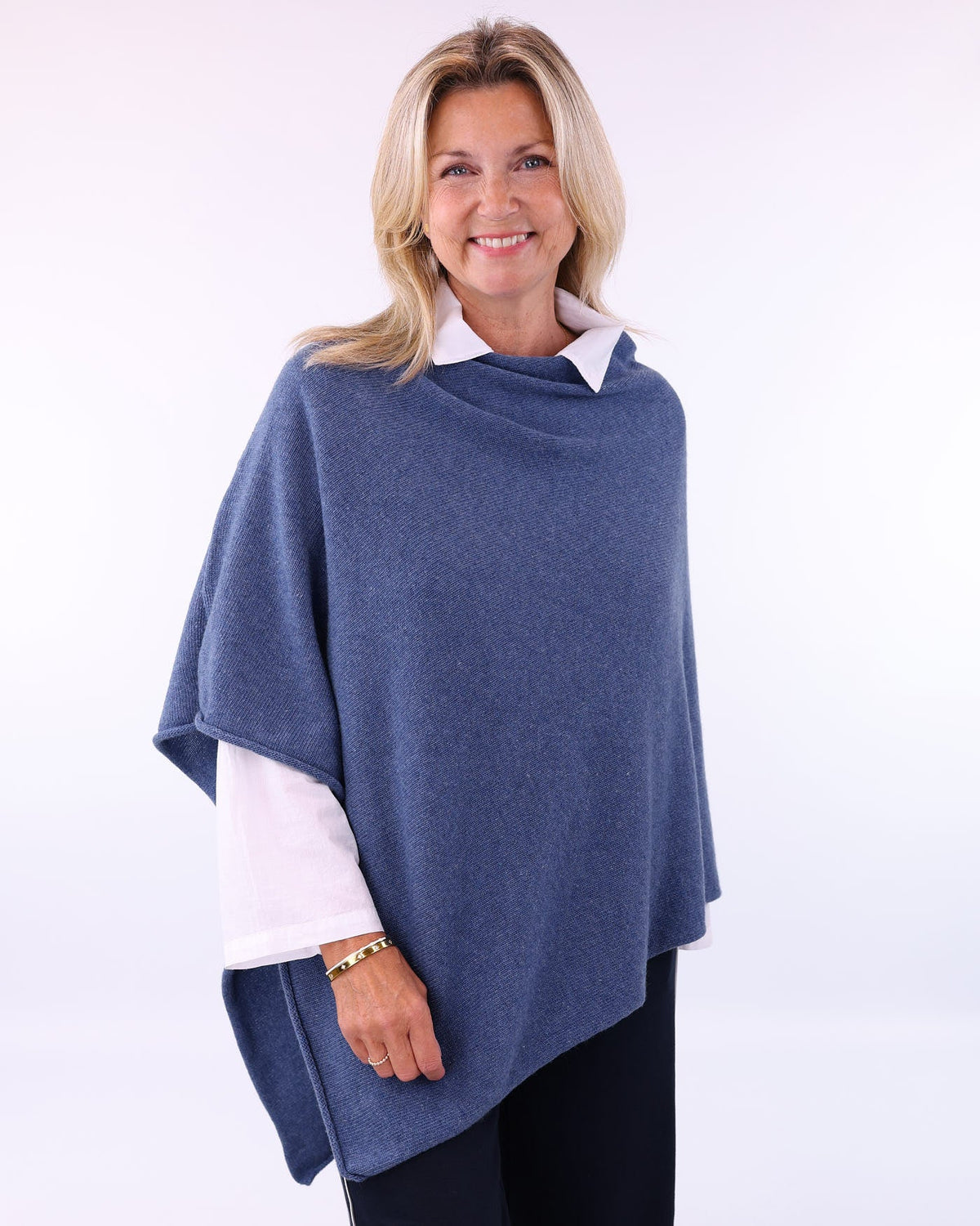Women's cashmere blend poncho in denim blue, made in Italy